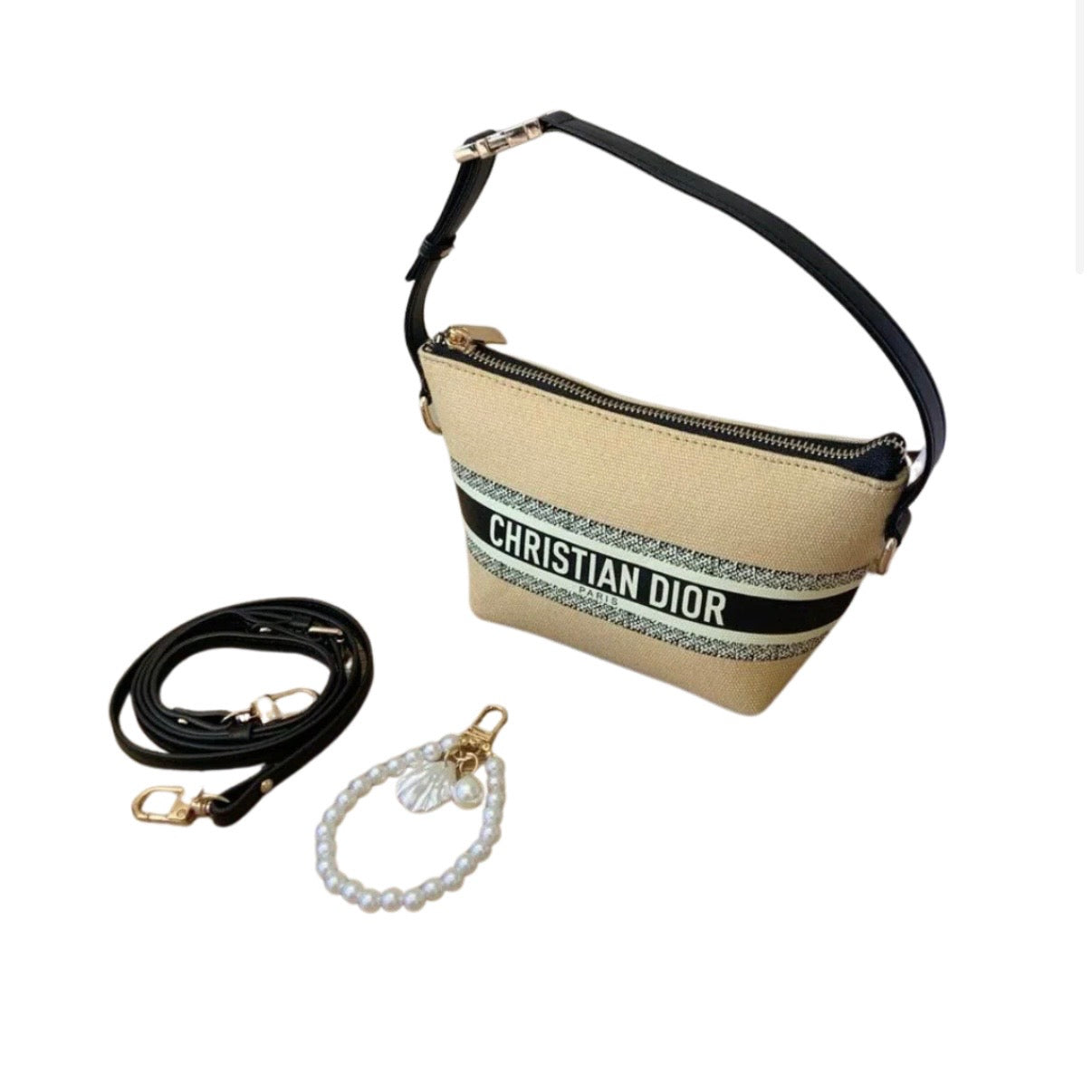 Dior handbag with leather strap + pearl charm