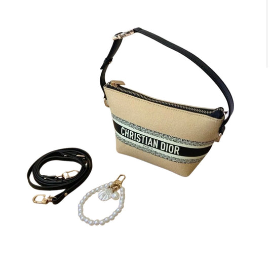 Dior handbag with leather strap + pearl charm